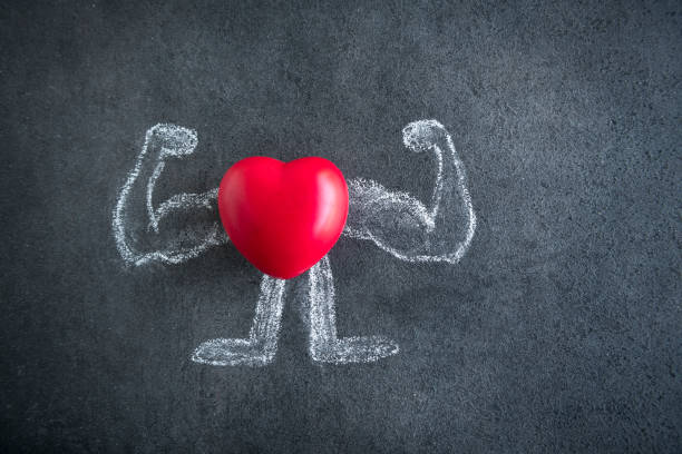 istock Heart and doodles on blackboard 1455685848