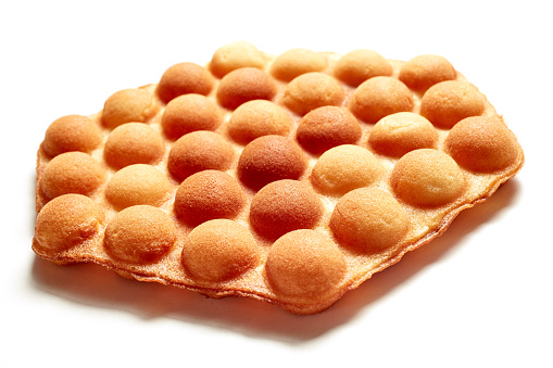An appetizing traditional bubble wafer placed on white background