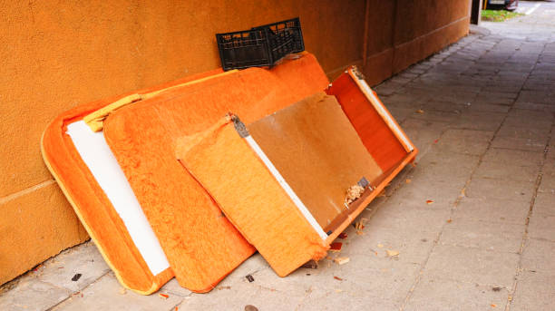 istock Closeup of a broken sofa outside 1455689489