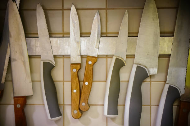 istock Closeup of knives on the wall 1455689563