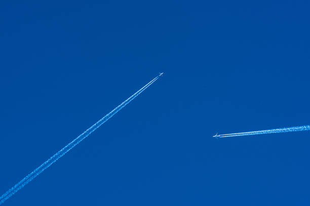 istock Airplanes in the blue sky 1455690022