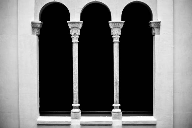 istock Closeup of arch windows with pillars 1455691236