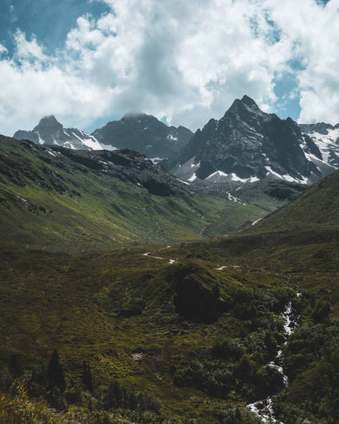 istock Stunning view of mountains with a field on the foreground 1455691276