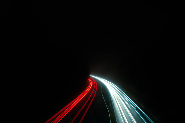 istock View of lights at night on a motorway bridge with long exposure 1455691296