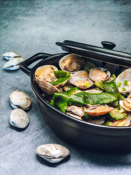 istock Braised Clam with Loofah & small Shrimp on a table 1455691563