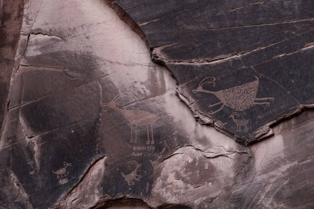 istock Native American petroglyphs carved on the rock in Monument Valley 1455694962