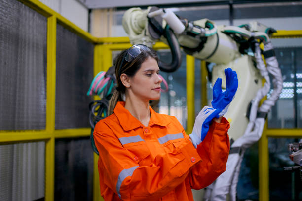 Technician work with robotic arm. stock photo