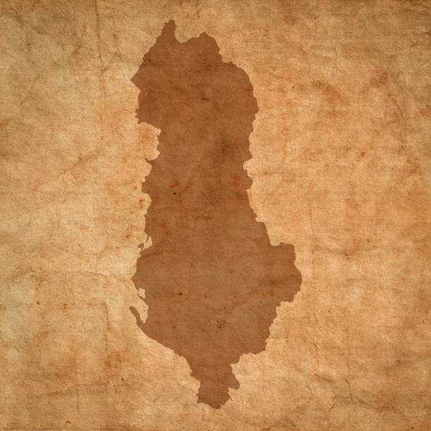 istock Albania map on old brown grunge paper 1455703329