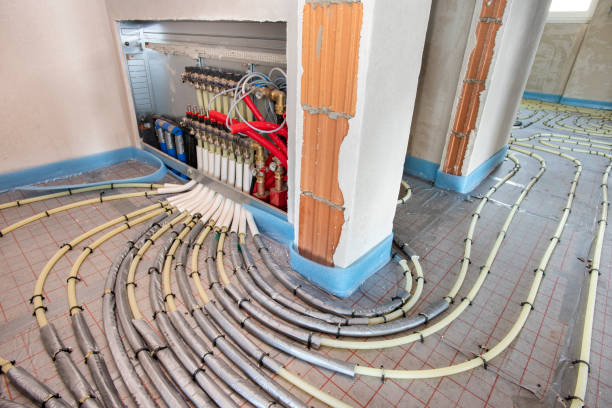 underfloor heating system in construction of new residential house stock photo