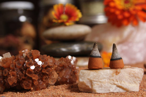 istock Aragonite Crystal With Incense Cones on Australian Red Sand 1455704082
