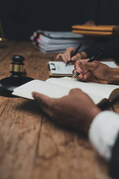 Lawyer business people working with agreement contract in office workplace for consultant lawyer concept Lawyer business people working with agreement contract in office workplace for consultant lawyer concept. office buddies stock pictures, royalty-free photos & images
