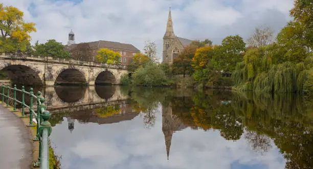 The English Bridge across the River Severn with United Reformed Church to the right hand side, Shrewsbury, Shropshire, England