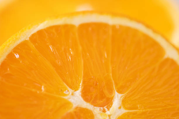 istock Sliced orange close up. Food background 1455708277