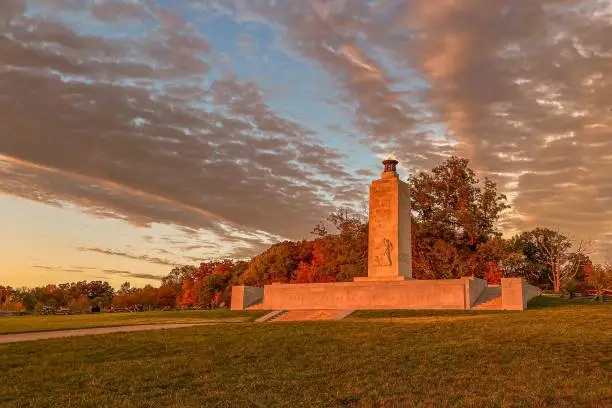 Photo of Scenic Eternal Light Peace Memorial against the sunset sky