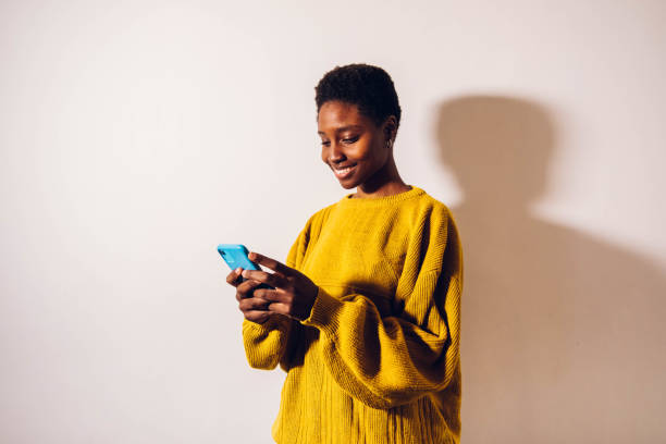 istock woman texting on cell phone 1455709770