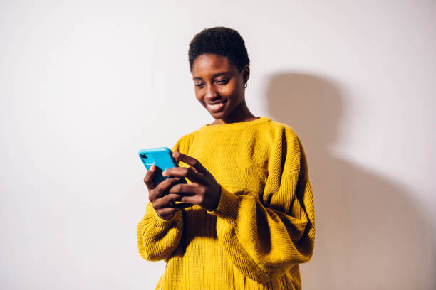 istock woman texting on cell phone 1455709772