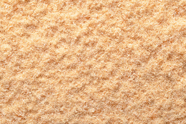 Wood flour, wood powder, fine sawdust, pulverized wood, close-up from above stock photo