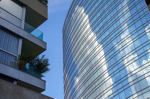 Panoramic view of Santiago, Chile, showcasing the modern skyline adorned with sleek glass skyscrapers.