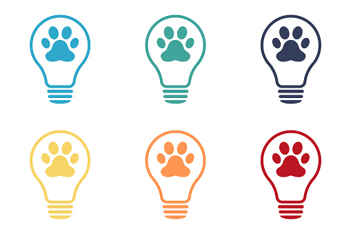 Animal paw icon on light bulb icons set