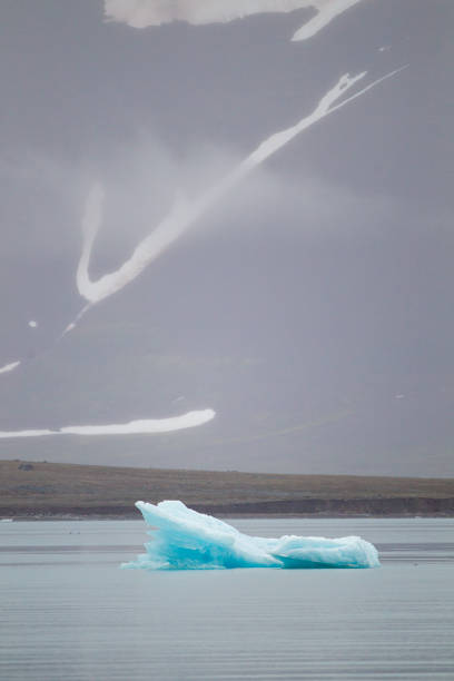 istock Glacial ice floating and calving in the Arctic landscape. 1455713650