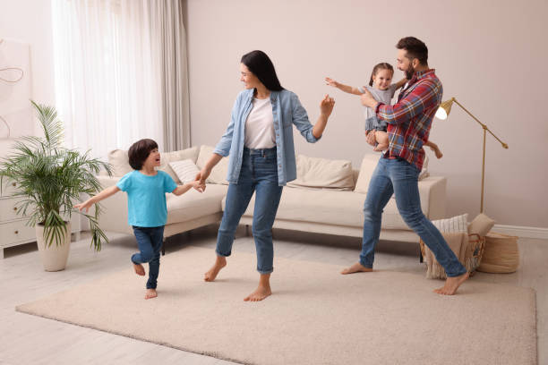 istock Happy family spending time together at home 1455714162