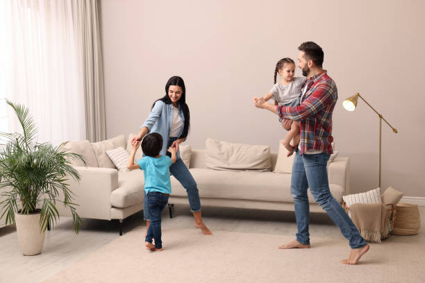 istock Happy family spending time together at home 1455714163