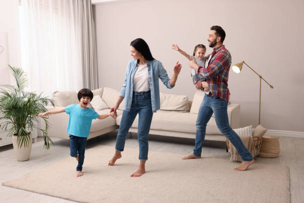 istock Happy family spending time together at home 1455714221