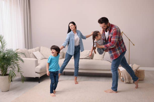 istock Happy family spending time together at home 1455714225