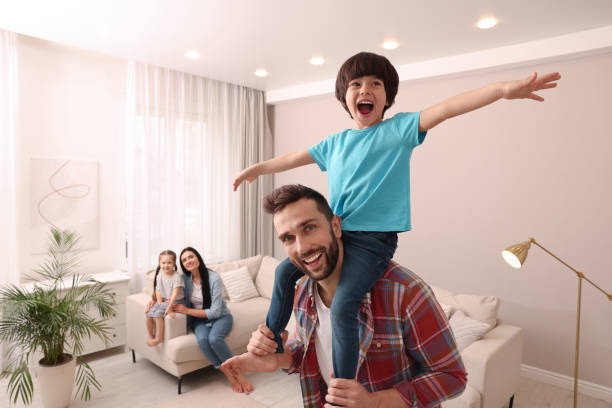 istock Happy family spending time together at home 1455714908