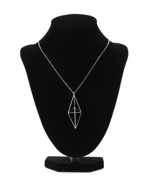 istock Stylish silver necklace on jewelry bust against white background 1455716646