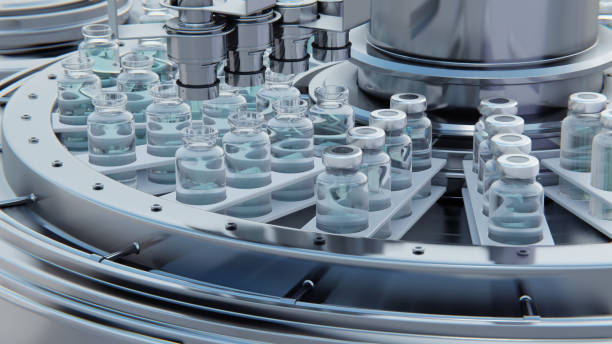 istock Close up 3d render. Vaccine manufacturing, machine puts caps on bottles vials passing on conveyor belt. Clear blue liquid. 1455726097