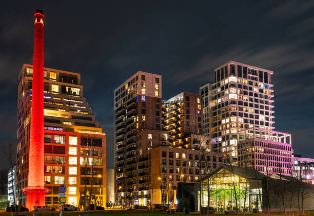 eindhoven strijp s district at night, modern buildings at the former industrial terrain - eindhoven imagens e fotografias de stock