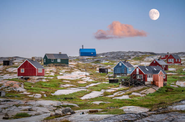 Rodebay Oqaatsut Settlement, Greenland Oqaatsut at dusk, formerly Rodebay, is a settlement in the Qaasuitsup municipality, in western Greenland. It had 29 inhabitants in 2020. ilulissat photos stock pictures, royalty-free photos & images