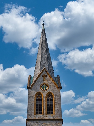 The upper tower of the collegiate church taken frontally on a beautiful day