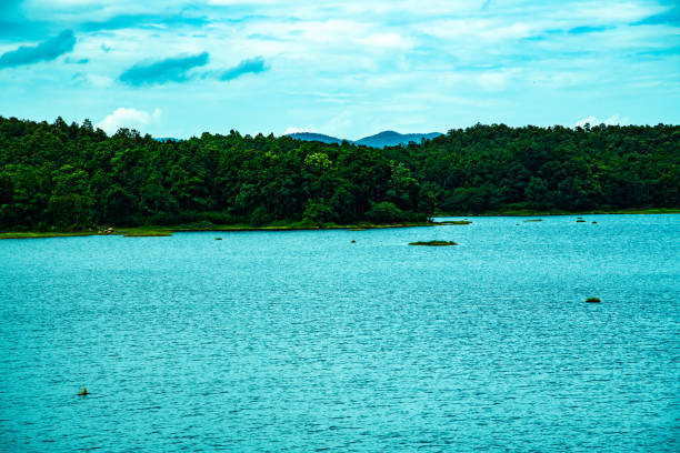 Choc, Castries, Saint Lucia, Windward Islands, West Indies: Rat Island - Bois D'Orange in the background - While not a major tourist destination in itself, Rat Island is often seen during harbor tours and serves as an interesting geographical feature in the waters off Castries, adding character to the maritime environment of Saint Lucia's capital - Gros Islet District.