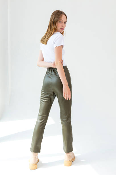 2,200+ Green Leather Pants Stock Photos, Pictures & Royalty-Free