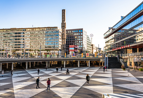 Stockholm, Sweden - People walking on the chequered pedestrian area below the street level in Sergels Torg, Stockholm's main city square.