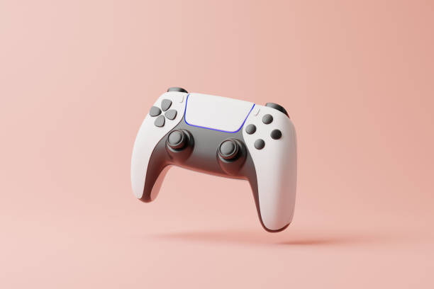 latający gamepad na różowym tle z miejscem na kopiowanie. joystick do gier wideo. kontroler gier. koncepcja creative minimal gaming. widok z przodu. ilustracja renderowania 3d - video game gamepad black isolated on white zdjęcia i obrazy z banku zdjęć