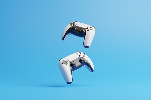 Flying gamepad on a blue background with copy space. Joystick for video game. Game controller. Creative Minimal Gaming concept. Front view. 3D rendering illustration