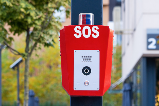 SOS, police, emergency button in a public park