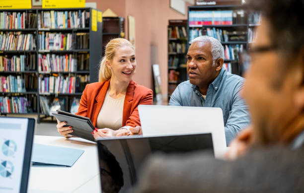 istock Business people having a meeting 1455752964
