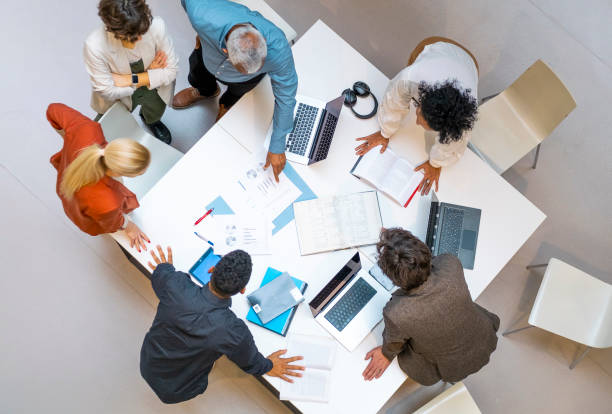 istock Business people having a meeting 1455753263