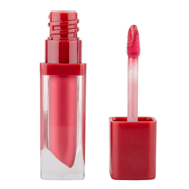 istock Lip gloss in a transparent package with a brush on an isolated white background 1455753933