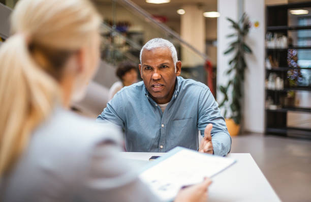 istock Business people having a meeting 1455754281