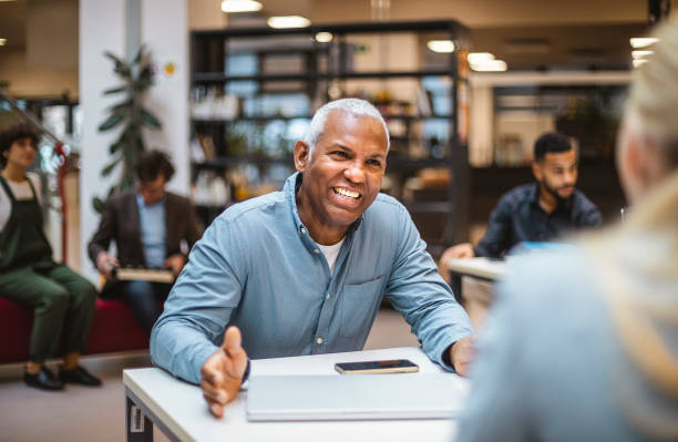 istock Business people having a meeting 1455754840