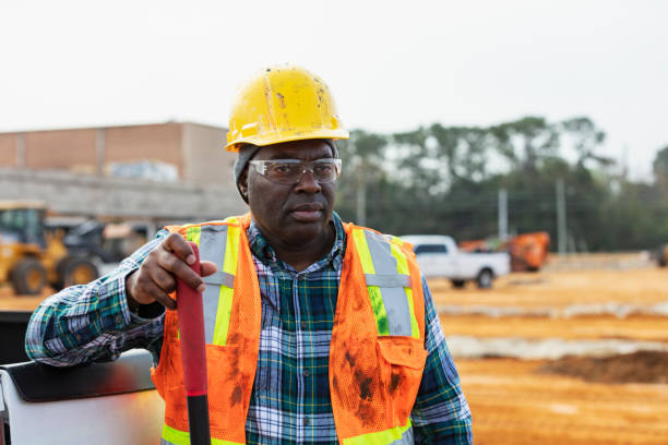 istock African-American construction worker with shovel 1455754918