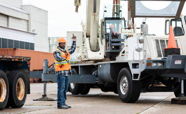 istock African-American man directing crane operator 1455755535