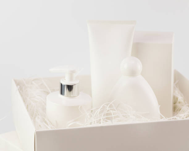 istock White cosmetic bottles in a white gift box on a light neutral background 1455756305