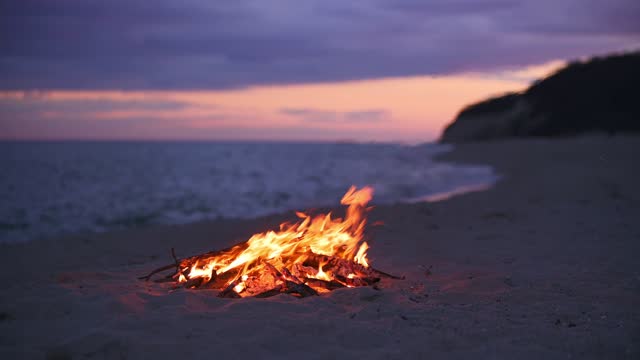 Beach Bonfire selective focus with Beautiful Sunset or sunrise nobody