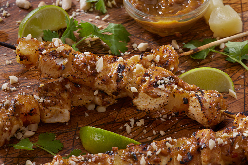 BBQ Pineapple Chicken Skewers in a Peanut Sauce with Cilantro and Lime